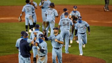 The Toronto Blue Jays celebrate after defeating the Boston Red Sox. (Photo by Bryan M. Bennett/Getty Images)