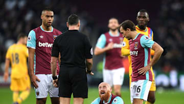 LONDON, ENGLAND - JANUARY 14: Winston Reid of West Ham United (L), James Collins of West Ham United (C) and Mark Noble of West Ham United (R) argue with the referee during the Premier League match between West Ham United and Crystal Palace at London Stadium on January 14, 2017 in London, England. (Photo by Shaun Botterill/Getty Images)