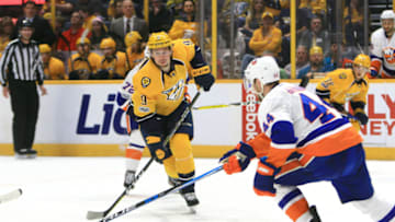 NASHVILLE, TN - APRIL 04: Nashville Predators left wing Filip Forsberg (9) skates with the puck during the NHL game between the Nashville Predators and the New York Islanders, held on April 4, 2017, at Bridgestone Arena in Nashville, Tennessee. (Photo by Danny Murphy/Icon Sportswire via Getty Images)