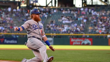 DENVER, CO - AUGUST 10: Justin Turner #10 of the Los Angeles Dodgers scores a first inning run against the Colorado Rockies at Coors Field on August 10, 2018 in Denver, Colorado. (Photo by Dustin Bradford/Getty Images)