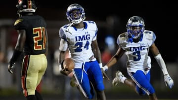 IMG Academy's Kamari Wilson (24) celebrates his interception against Ravenwood with IMG Academy's Oj Burroughs (3) tduring the second half at Ravenwood High School in Brentwood, Tenn., Friday, Sept. 25, 2020.Rhs Img 092520 An 028