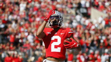 Ohio State Buckeyes wide receiver Chris Olave (2) blows a kiss to the sky after scoring a touchdown during the second quarter of a NCAA Division I football game between the Ohio State Buckeyes and the Maryland Terrapins on Saturday, Oct. 9, 2021 at Ohio Stadium in Columbus, Ohio.Cfb Maryland Terrapins At Ohio State Buckeyes