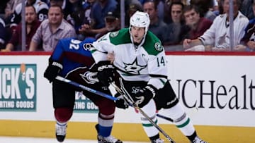 Oct 15, 2016; Denver, CO, USA; Dallas Stars left wing Jamie Benn (14) controls the puck ahead of Colorado Avalanche left wing Gabriel Landeskog (92) in the third period at the Pepsi Center. The Avalanche won 6-5. Mandatory Credit: Isaiah J. Downing-USA TODAY Sports