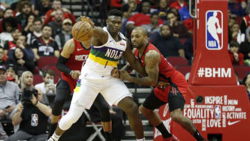 HOUSTON, TEXAS - FEBRUARY 02: P.J. Tucker #17 of the Houston Rockets defends Zion Williamson #1 of the New Orleans Pelicans in the first half at Toyota Center on February 02, 2020 in Houston, Texas. NOTE TO USER: User expressly acknowledges and agrees that, by downloading and or using this photograph, User is consenting to the terms and conditions of the Getty Images License Agreement. (Photo by Tim Warner/Getty Images)