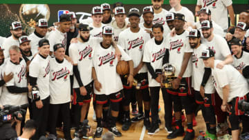 BOSTON, MASSACHUSETTS - MAY 29: The Miami Heat pose with the Bob Cousy Trophy after defeating the Boston Celtics 103-84 in game seven of the Eastern Conference Finals at TD Garden on May 29, 2023 in Boston, Massachusetts. NOTE TO USER: User expressly acknowledges and agrees that, by downloading and or using this photograph, User is consenting to the terms and conditions of the Getty Images License Agreement. (Photo by Adam Glanzman/Getty Images)
