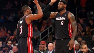 Feb 1, 2014; New York, NY, USA; Miami Heat small forward LeBron James (6) high fives Heat shooting guard Dwyane Wade (3) during the fourth quarter of a game against the New York Knicks at Madison Square Garden. The Heat defeated the Knicks 106-91. Mandatory Credit: Brad Penner-USA TODAY Sports