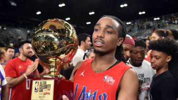 LOS ANGELES, CA - FEBRUARY 16: Recording artist Quavo poses with the Celebrity All-Star MVP award during the NBA All-Star Celebrity Game 2018 presented by Ruffles at Verizon Up Arena at LACC on February 16, 2018 in Los Angeles, California. (Photo by Kevin Mazur/WireImage)