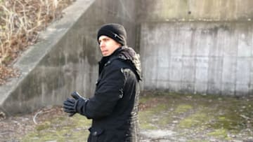 Host Christopher Garetano outside Camp Hero Tunnels before meeting with a Montauk Historian, as seen on Travel Channel's Strange World