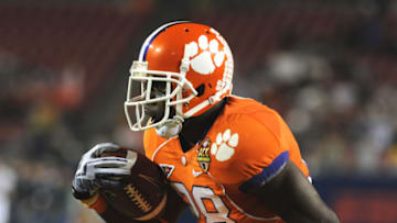 TAMPA, FL - DECEMBER 5: Running C. J. Spiller #28 of the Clemson Tigers high steps for a six-yard touchdown run against the Georgia Tech Yellow Jackets in the 2009 ACC Football Championship Game December 5, 2009 at Raymond James Stadium in Tampa, Florida. (Photo by Al Messerschmidt/Getty Images)