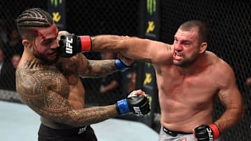 ADELAIDE, AUSTRALIA - DECEMBER 02: (R-L) Mauricio 'Shogun' Rua of Brazil punches Tyson Pedro of Australia in their light heavyweight bout during the UFC Fight Night event inside Adelaide Entertainment Centre on December 2, 2018 in Adelaide, Australia. (Photo by Jeff Bottari/Zuffa LLC/Zuffa LLC via Getty Images)