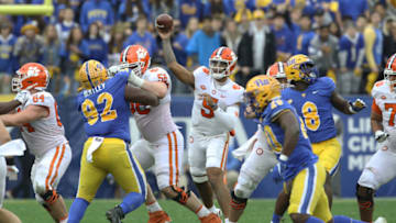 Oct 23, 2021; Pittsburgh, Pennsylvania, USA; Clemson Tigers quarterback D.J. Uiagalelei (5) passes the ball against the Pittsburgh Panthers during the second quarter at Heinz Field. Mandatory Credit: Charles LeClaire-USA TODAY Sports