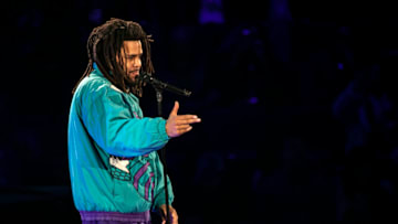 CHARLOTTE, NORTH CAROLINA - FEBRUARY 17: Rapper J. Cole performs during halftime of the 68th NBA All-Star Game on February 17, 2019 in Charlotte, North Carolina. (Photo by Jeff Hahne/Getty Images)