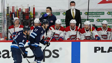 WINNIPEG, MB - JUNE 2: Adam Lowry #17 of the Winnipeg Jets skates scores on Carey Price #31 of the Montreal Canadiens in first period action during Game One of the Second Round of the 2021 Stanley Cup Playoffs on June 2, 2021 at Bell MTS Place in Winnipeg, Manitoba, Canada. (Photo by David Lipnowski/Getty Images)