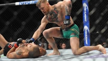 December 12, 2015; Las Vegas, NV, USA; Conor McGregor moves in to land punches and win via technical knockout against Jose Aldo during UFC 194 at MGM Grand Garden Arena. Mandatory Credit: Gary A. Vasquez-USA TODAY Sports