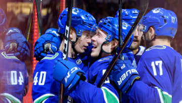 VANCOUVER, BC - MARCH 15: Vancouver Canucks Center Elias Pettersson (40) is congratulated by Right wing Brock Boeser (6) after scoring a goal against the New Jersey Devils during their NHL game at Rogers Arena on March 15, 2019 in Vancouver, British Columbia, Canada. New Jersey won 3-2 in a shootout. (Photo by Derek Cain/Icon Sportswire via Getty Images)