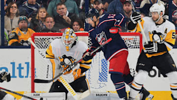 COLUMBUS, OH - APRIL 5: Goaltender Matt Murray #30 of the Pittsburgh Penguins defends the net as Cam Atkinson #13 of the Columbus Blue Jackets attempts to redirect the puck on April 5, 2018 at Nationwide Arena in Columbus, Ohio. (Photo by Jamie Sabau/NHLI via Getty Images) *** Local Caption *** Matt Murray;Cam Atkinson
