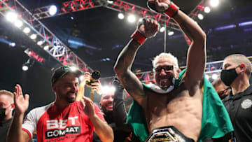 LAS VEGAS, NEVADA - DECEMBER 11: Charles Oliveira of Brazil celebrates after defeating Dustin Poirier to defend his lightweight title during the UFC 269 event at T-Mobile Arena on December 11, 2021 in Las Vegas, Nevada. (Photo by Carmen Mandato/Getty Images)