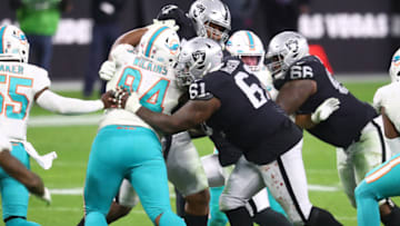 Dec 26, 2020; Paradise, Nevada, USA; Las Vegas Raiders center Rodney Hudson (61) against Miami Dolphins defensive tackle Christian Wilkins (94) at Allegiant Stadium. Mandatory Credit: Mark J. Rebilas-USA TODAY Sports