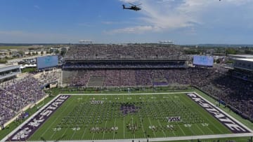 MANHATTAN, KS - SEPTEMBER 17: US Army Combat Apache helicopters fly over Bill Snyder Family Football Stadium before a game between the Kansas State Wildcats and Tulane Green Wave on September 17, 2022 in Manhattan, Kansas. (Photo by Peter Aiken/Getty Images)