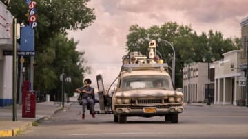 Phoebe (Mckenna Grace) in the Ecto-1 jumpseat in Columbia Pictures' GHOSTBUSTERS: AFTERLIFE.