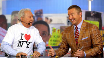 NEW YORK, NY - SEPTEMBER 23: ESPN College Gameday Analysts Lee Corso (L) and Kirk Herbstreit discuss College Gameday at Times Square on September 23, 2017 in New York City. (Photo by Abbie Parr/Getty Images)