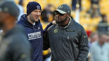 Nov 13, 2016; Pittsburgh, PA, USA; Dallas Cowboys quarterback Tony Romo (left) and Pittsburgh Steelers head coach Mike Tomlin talk before their game at Heinz Field. Mandatory Credit: Jason Bridge-USA TODAY Sports