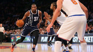 Jan 26, 2016; New York, NY, USA; Oklahoma City Thunder small forward Kevin Durant (35) drives against New York Knicks power forward Derrick Williams (23) and center Robin Lopez (8) during the first quarter at Madison Square Garden. Mandatory Credit: Brad Penner-USA TODAY Sports