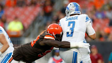 CLEVELAND, OH - AUGUST 29: Devaroe Lawrence #99 of the Cleveland Browns sacks Tom Savage #3 of the Detroit Lions during the first quarter of the preseason game at FirstEnergy Stadium on August 29, 2019 in Cleveland, Ohio. (Photo by Kirk Irwin/Getty Images)