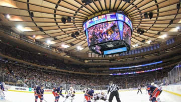Mar 18, 2015; New York, NY, USA; Chicago Blackhawks center Jonathan Toews (19) and New York Rangers center Derek Stepan (21) face off during the first period at Madison Square Garden. Mandatory Credit: Ed Mulholland-USA TODAY Sports