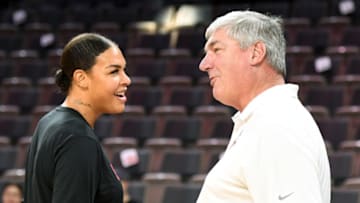 LAS VEGAS, NEVADA - AUGUST 11: Liz Cambage #8 and head coach Bill Laimbeer of the Las Vegas Aces talk before their game against the Connecticut Sun at the Mandalay Bay Events Center on August 11, 2019 in Las Vegas, Nevada. The Aces defeated the Sun 89-81. NOTE TO USER: User expressly acknowledges and agrees that, by downloading and or using this photograph, User is consenting to the terms and conditions of the Getty Images License Agreement. (Photo by Ethan Miller/Getty Images )
