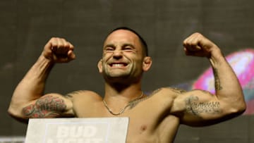 LAS VEGAS, NV - JULY 08: Mixed martial artist Frankie Edgar poses on the scale during his weigh-in for UFC 200 at T-Mobile Arena on July 8, 2016 in Las Vegas, Nevada. Edgar will fight Jose Aldo for the interim UFC featherweight championship on July 9 at T-Mobile Arena. (Photo by Ethan Miller/Getty Images)