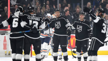 Feb 7, 2018; Los Angeles, CA, USA; Los Angeles Kings defenseman Jake Muzzin (6) and center Trevor Lewis (22) and defenseman Paul LaDue (38) and center Torrey Mitchell (71) celebrate with left wing Kyle Clifford (13) after scoring a goal in the first period against the Edmonton Oilers at Staples Center. Mandatory Credit: Jayne Kamin-Oncea-USA TODAY Sports