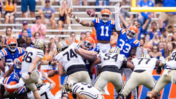 GAINESVILLE, FLORIDA - OCTOBER 09: Mohamoud Diabate #11 and Princely Umanmielen #33 of the Florida Gators attempt to block a field goal during the second half of a game against the Vanderbilt Commodores at Ben Hill Griffin Stadium on October 09, 2021 in Gainesville, Florida. (Photo by James Gilbert/Getty Images)
