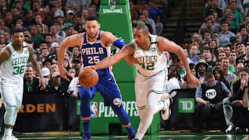 BOSTON, MA - May 3: Al Horford #42 of the Boston Celtics reaches for the ball against Ben Simmons #25 of the Philadelphia 76ers in Game Two of Round Two of the 2018 NBA Playoffs on May 3, 2018 at the TD Garden in Boston, Massachusetts. NOTE TO USER: User expressly acknowledges and agrees that, by downloading and or using this photograph, User is consenting to the terms and conditions of the Getty Images License Agreement. Mandatory Copyright Notice: Copyright 2018 NBAE (Photo by Brian Babineau/NBAE via Getty Images)