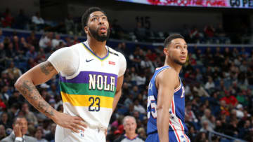 NEW ORLEANS, LA - FEBRUARY 25: Anthony Davis #23 of the New Orleans Pelicans and Ben Simmons #25 of the Philadelphia 76ers look on during a game on February 25, 2019 at the Smoothie King Center in New Orleans, Louisiana. NOTE TO USER: User expressly acknowledges and agrees that, by downloading and or using this Photograph, user is consenting to the terms and conditions of the Getty Images License Agreement. Mandatory Copyright Notice: Copyright 2019 NBAE (Photo by Layne Murdoch Jr./NBAE via Getty Images)