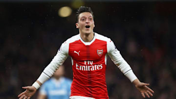 LONDON, ENGLAND - DECEMBER 10: Mesut Ozil of Arsenal celebrates scoring his sides second goal during the Premier League match between Arsenal and Stoke City at the Emirates Stadium on December 10, 2016 in London, England. (Photo by Julian Finney/Getty Images)