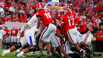 Will Levis attempts to dive over the defense but fails to score against the Georgia Bulldogs. (Photo by Todd Kirkland/Getty Images)