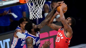Big Norvel Pelle, pictured here with the Philadelphia 76ers, blocks a shot. (Photo by Ashley Landis-Pool/Getty Images)