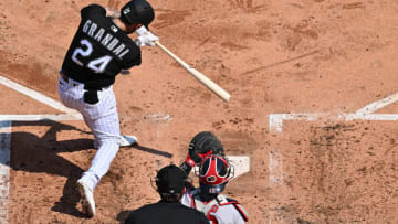 Jun 24, 2023; Chicago, Illinois, USA; Chicago White Sox catcher Yasmani Grandal (24) hits a home run in the second inning against the Boston Red Sox at Guaranteed Rate Field. Mandatory Credit: Jamie Sabau-USA TODAY Sports