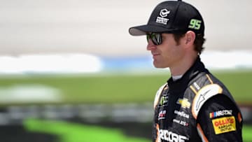 TALLADEGA, AL - APRIL 28: Kasey Kahne, driver of the #95 Procore Safety Qualified Chevrolet, stands on the grid during qualifying for the Monster Energy NASCAR Cup Series GEICO 500 at Talladega Superspeedway on April 28, 2018 in Talladega, Alabama. (Photo by Jared C. Tilton/Getty Images)