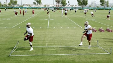 SANTA CLARA, CA - JULY 29: The San Francisco 49ers run their drills on the practice field during training camp at the 49ers practice facilities on July 29, 2003 in Santa Clara, California. (Photo by Jed Jacobsohn/Getty Images)