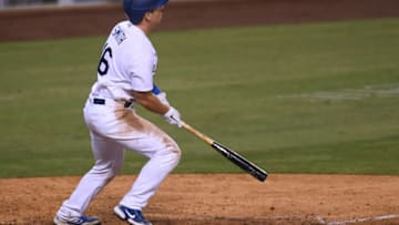 LOS ANGELES, CALIFORNIA - SEPTEMBER 02: Will Smith #16 of the Los Angeles Dodgers hits a single to score the game winning run for a 3-2 win over the Arizona Diamondbacks during the tenth inning at Dodger Stadium on September 02, 2020 in Los Angeles, California. (Photo by Harry How/Getty Images)