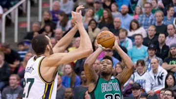 Feb 19, 2016; Salt Lake City, UT, USA; Boston Celtics guard Marcus Smart (36) shoots the ball against Utah Jazz center Rudy Gobert (27) during the first half at Vivint Smart Home Arena. Mandatory Credit: Russ Isabella-USA TODAY Sports
