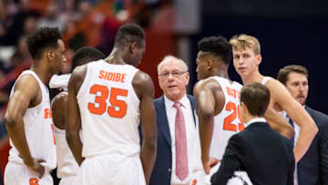 SYRACUSE, NY - NOVEMBER 10: Head coach Jim Boeheim of the Syracuse Orange speaks to his players in a huddle during the first half against the Cornell Big Red at the Carrier Dome on November 10, 2017 in Syracuse, New York. Syracuse defeats Cornell 77-45. (Photo by Brett Carlsen/Getty Images)