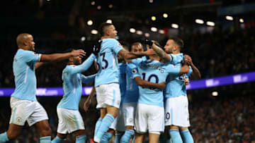 MANCHESTER, ENGLAND - NOVEMBER 29: Nicolas Otamendi of Manchester City celebrates his sides fist goal with his Manchester City team mates after Virgil van Dijk of Southampton scored a own goal during the Premier League match between Manchester City and Southampton at Etihad Stadium on November 29, 2017 in Manchester, England. (Photo by Clive Brunskill/Getty Images)