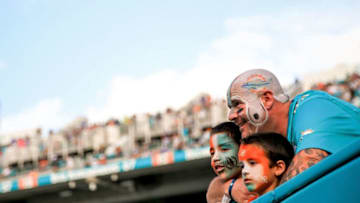 MIAMI GARDENS, FL - DECEMBER 27: Miami Dolphins fans look on during the second half of the game against the Indianapolis Colts at Sun Life Stadium on December 27, 2015 in Miami Gardens, Florida. (Photo by Rob Foldy/Getty Images)