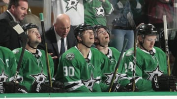 DALLAS, TX - OCTOBER 19: Jason Spezza #90 of the Dallas Stars gets a word of encouragement from his coach Jim Montgomery after he scores a goal against the Minnesota Wild at the American Airlines Center on October 19, 2018 in Dallas, Texas. (Photo by Glenn James/NHLI via Getty Images)