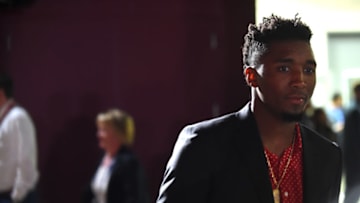 CLEVELAND,OH - June 6: Donovan Mitchell #45 of the Utah Jazz arrives at the stadium before the game between Cleveland Cavaliers and Golden State Warriors in Game Three of the 2018 NBA Finals on June 6, 2018 at Quicken Loans Arena in Cleveland, Ohio. NOTE TO USER: User expressly acknowledges and agrees that, by downloading and/or using this photograph, user is consenting to the terms and conditions of the Getty Images License Agreement. Mandatory Copyright Notice: Copyright 2018 NBAE (Photo by Noah Graham/NBAE via Getty Images)