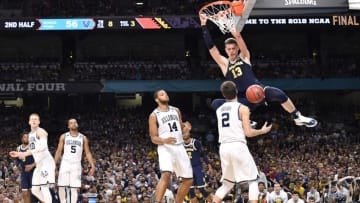SAN ANTONIO, TX - APRIL 2: Moritz Wagner #13 of the Michigan Wolverines dunks against the Villanova Wildcats during the 2018 NCAA Men's Final Four Championship game at the Alamodome on April 2, 2018 in San Antonio, Texas. (Photo by Brett Wilhelm/NCAA Photos via Getty Images)