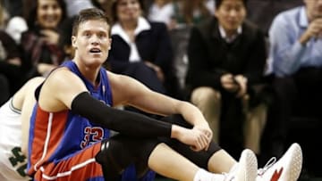 Apr 3, 2013; Boston, MA, USA; Detroit Pistons power forward Jonas Jerebko (33) sits on the floor after loosing the ball out of bounds during the fourth quarter of their 98-93 loss to the Boston Celtics in an NBA game at TD Garden. Mandatory Credit: Winslow Townson-USA TODAY Sports